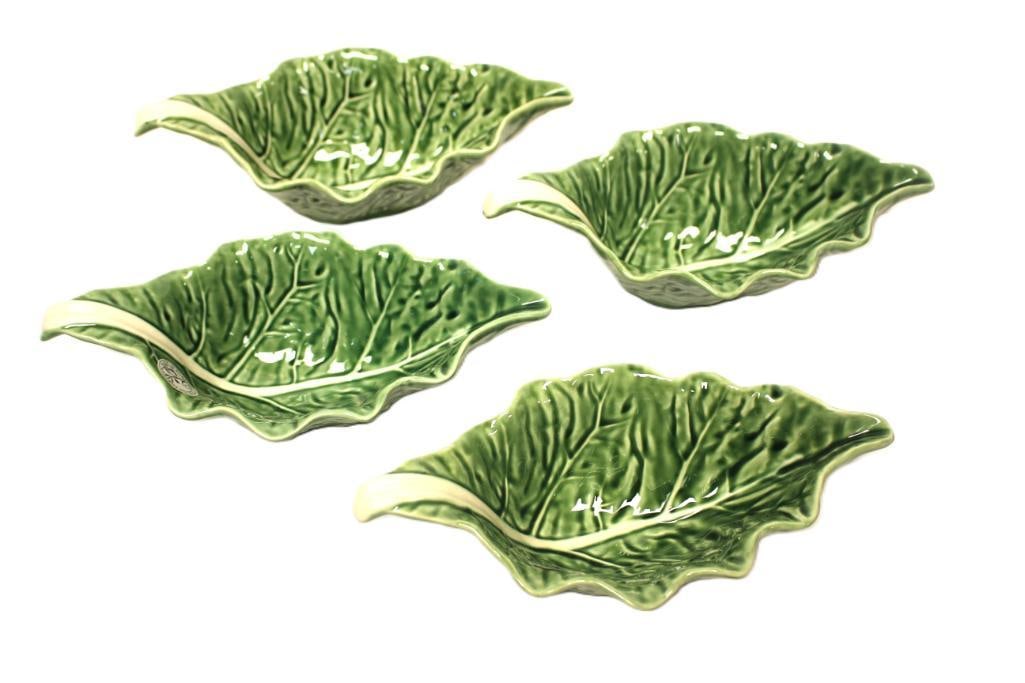 NEW Bordallo Pinneiro lot of 4 leaf shaped bowls Portugal: Bordallo Pinnerio lot of 4 green leaf shape bowls. 10" long, 5" wide, 3" tall. Made in Portugal.