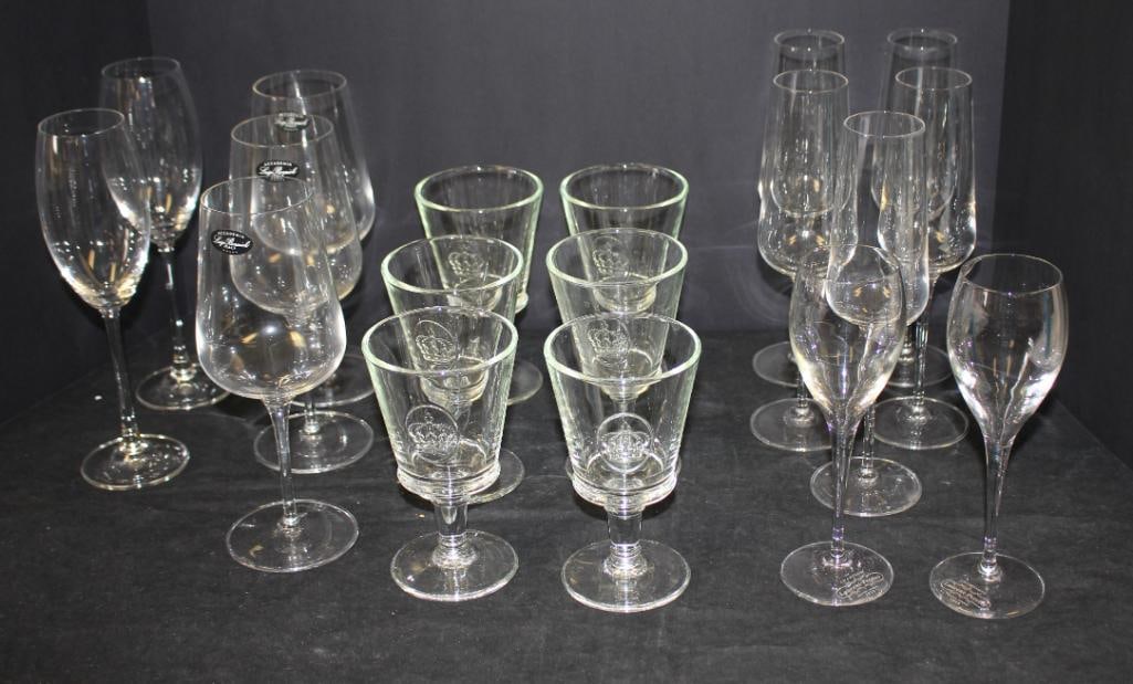 NEW Luigi Bormioli assorted glassware Made in Italy lot of 18: NEW 3 wine glasses 9"h, 2 wine flutes 9 1/2"h, 2 cordial glasses 7"h, 5 champagne flutes 9 1/2"h, 6 water goblets 6"h. Most Made in Italy