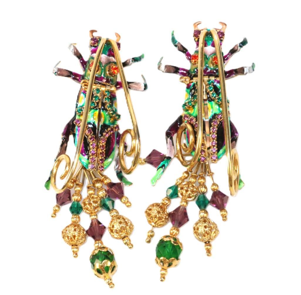 LUNCH AT THE RITZ 24 Kt gold plated Large Chinese Tiger Beetle Pierced Earrings: MADE IN THE USA. Signed Lunch at the Ritz. Huge colorful Beetles in jewel tones large crystals and filigree balls. Huge gold Antennae. Measure: 1.25" wide x 3.25" long.