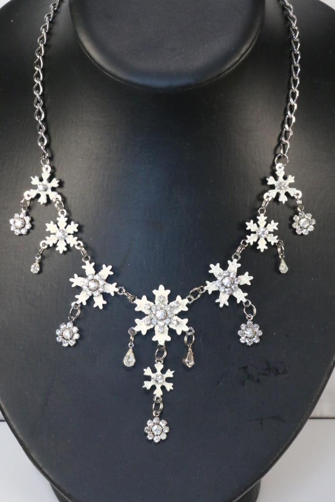 NEW in the box LUNCH AT THE RITZ LATR 2 GO Rhodium plated Snowflake necklace: Signed LATR2GO BRAND NEW in the gold lame lunch at the ritz pouch and box, ALTR2GO gorgeous snowflake necklace. Adjustable from 17.5" to 20.5". 7 beautiful sparkly shimmering snowflakes with crystals.