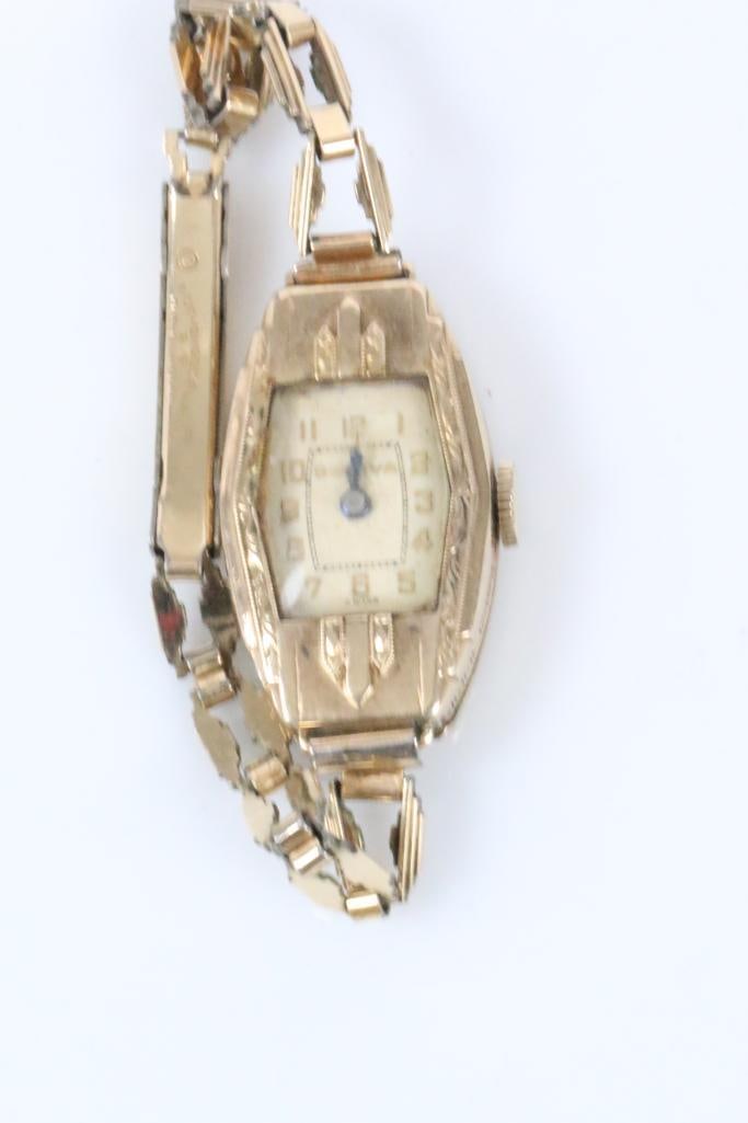 10kt Rolled Gold Plate Ladies Bulova Swiss Antique Victorian Watch.: Lovely Ladies Victorian design watch back is marked 10kt rod gold The bracelet is marked 1/20 12kt Gold filled. Watch is 1.25" x 3/4" wide. Winds up. Not working