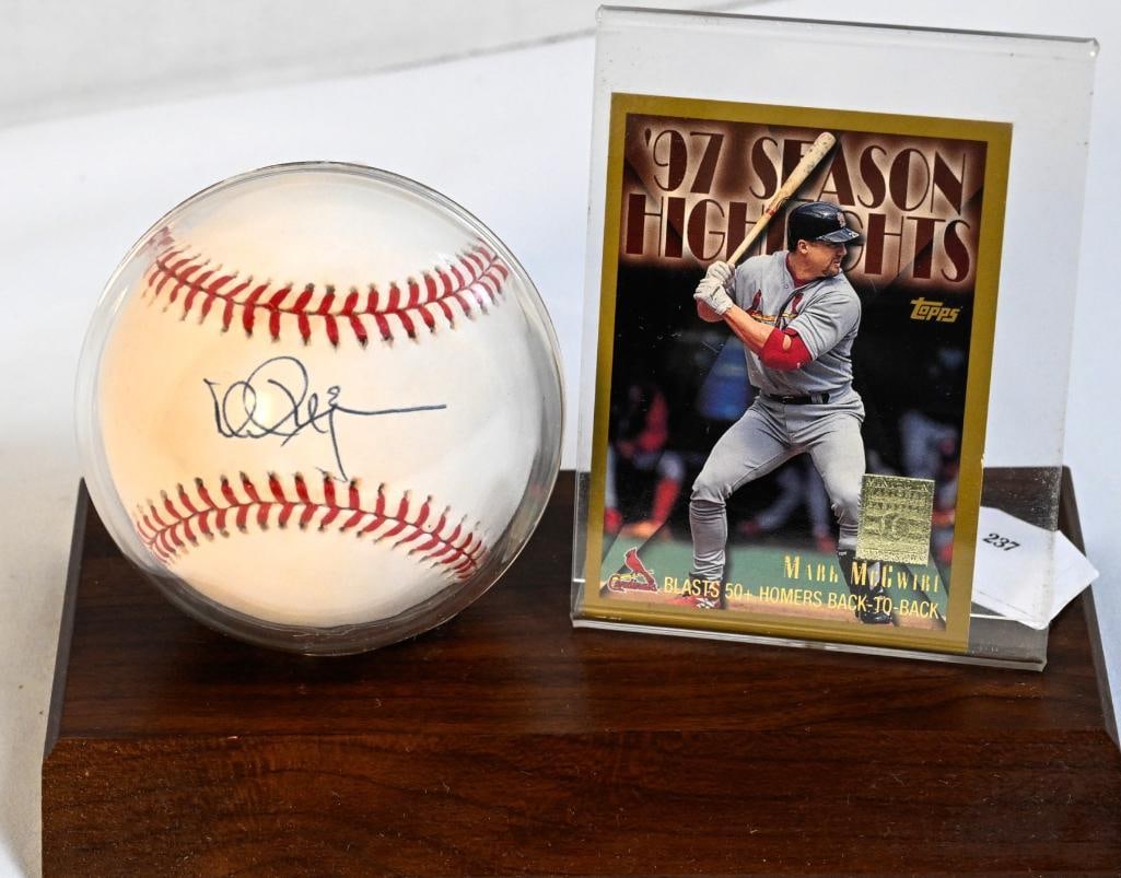 Mark McGwire St. Louis Cardinals Autographed Baseball on Stand with 97 Season Highlights Card - Blue (1 of 8)