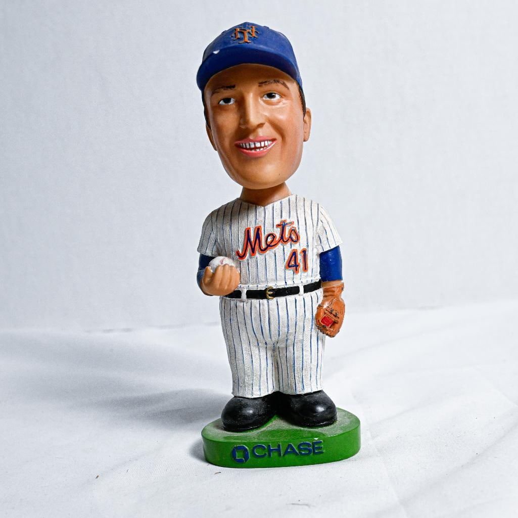 Tom Seaver New York Mets Tom Seaver Damaged (see head) BobbleHead 8 inches tall - Hall of Fame: This rare and highly coveted AUTHENTIC collector’s BobbleHead Tom Seaver Damaged (see head) BobbleHead 8 inches tall by Tom Seaver from New York Mets represents a piece of Baseball History. This