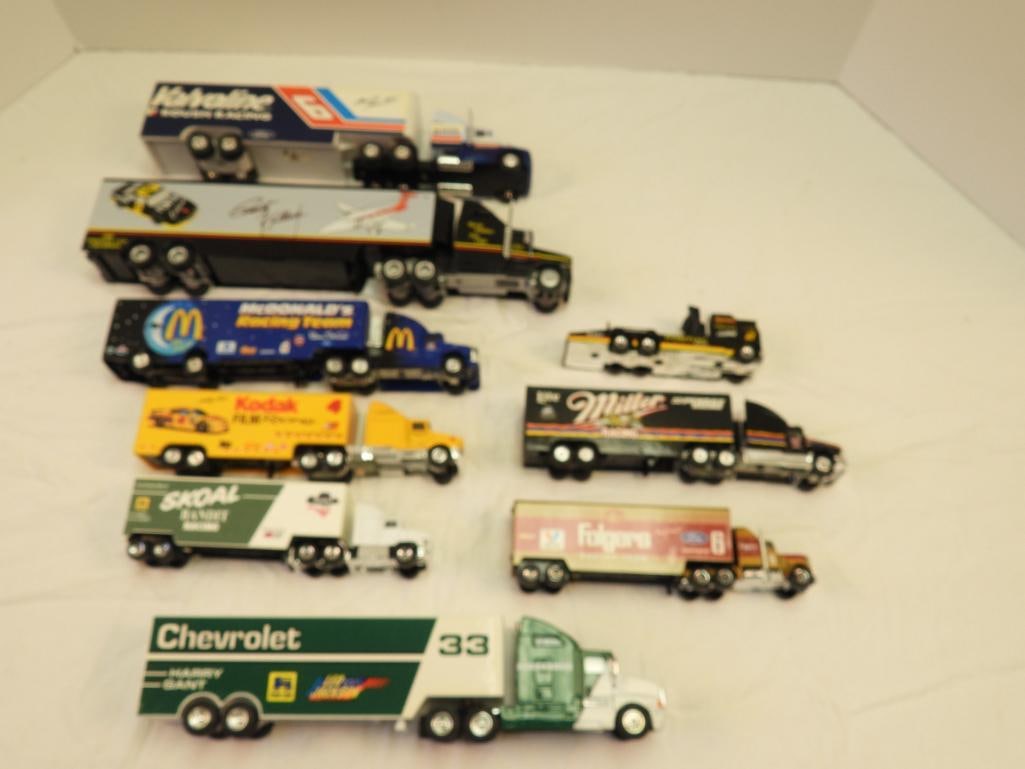 Lot of 9 assorted sizes NACCAR & Matchbox Transporters diecast truck replicas, Rusty Wallace & other (1 of 12)