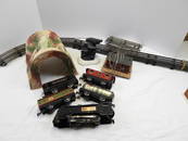 lot of 16 assorted metal trains, curved track, mountain tunnel, transformer, & more