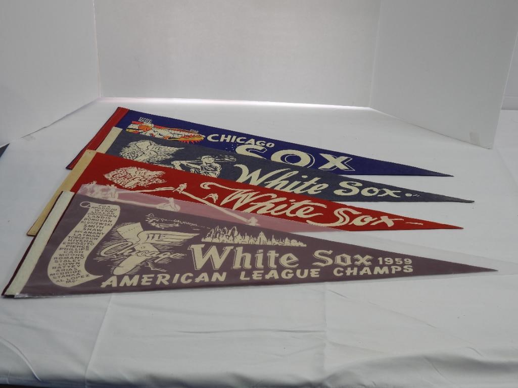 lot of 4 vintage Chicago White Sox felt pennants: 30" long. Minor wear due to age.