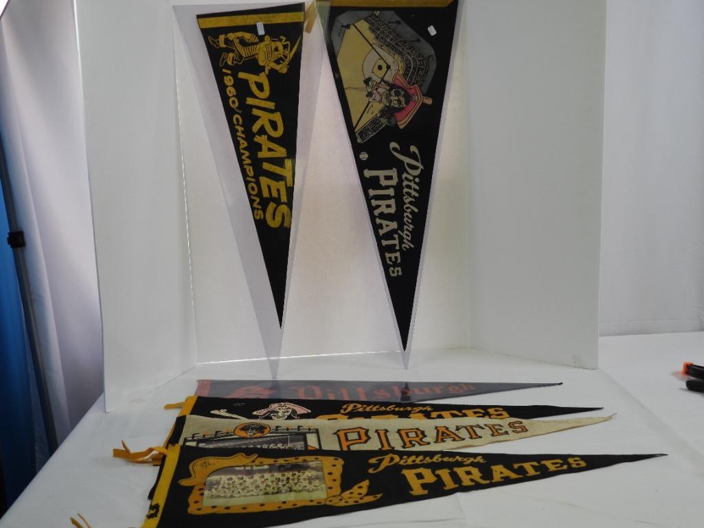 lot of 6 Pittsburgh Pirates vintage felt pennants, including Championship pennant: 30" long. Minor wear due to age. 2 w/ covers.
