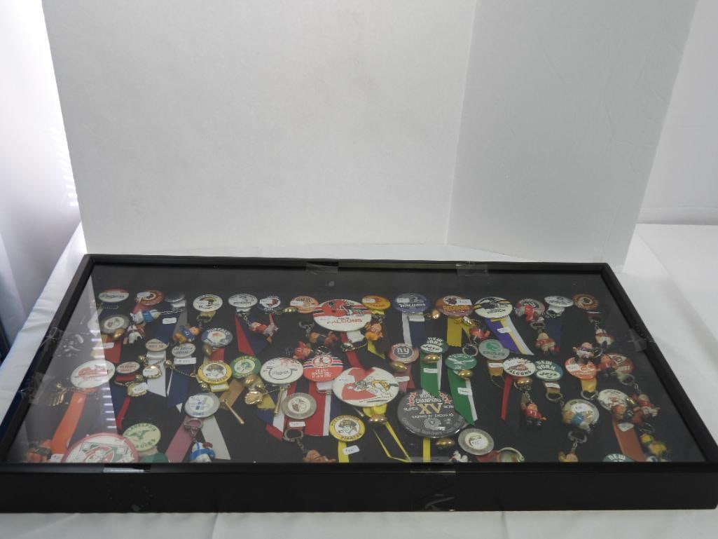 lot of 47 assorted NFL team pins, some w/ ribbons/player figure/football charms, in a display box (1 of 8)