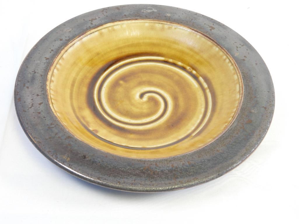 Vintage handmade/hand painted round bronze ceramic pottery plate w/ swirl, signed (1 of 5)