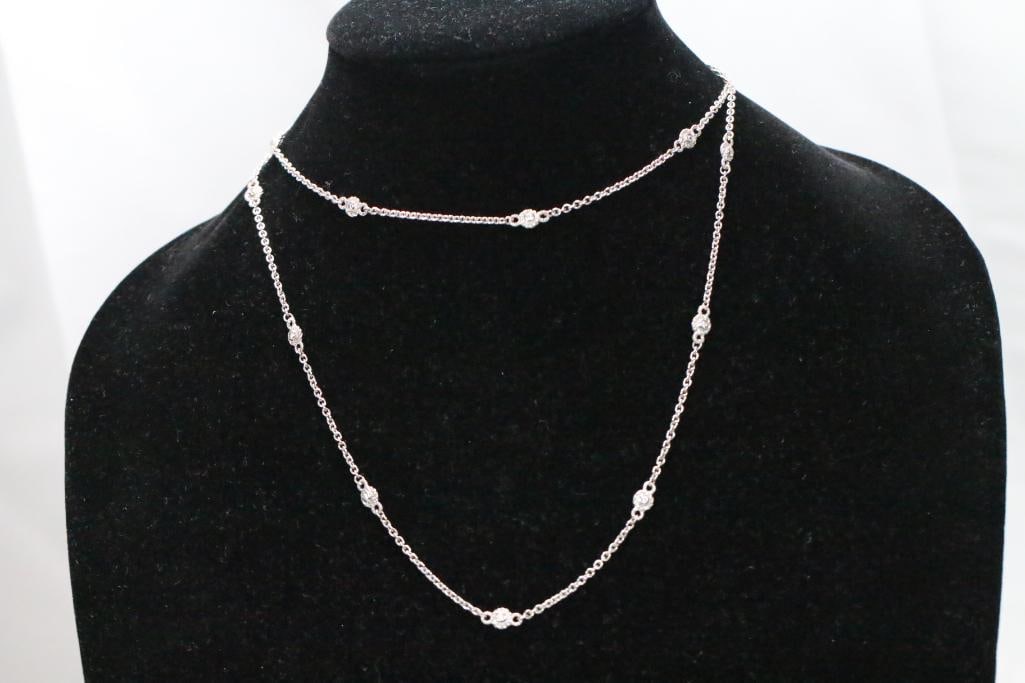 New Judith Ripka Sterling Silver and diamonique CZ Station Necklace, Signed: New sterling silver and diamonique CZ necklace, 36" long, signed on clasp