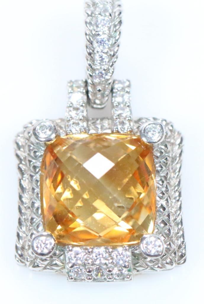 NEW Judith Ripka Sterling Silver large yellow topaz and Diamonique Pendant: New sterling silver, yellow topaz surrounded by diamonique faux diamonds pendant 3/4" x 1 1/4" including hinged bail