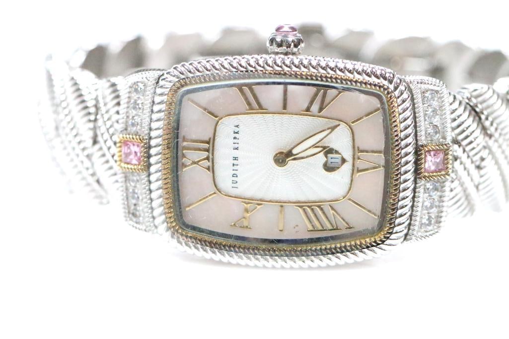 NEW Judith Ripka Mother of pearl Watch in Box WORKS : New in the pouch and box. Beautiful Mother of pearl watch with heart date, roman numerals. Swirl brushed silver tone design with 2 tone gold tone rope border with clear CZ and pink crystal accents. Me