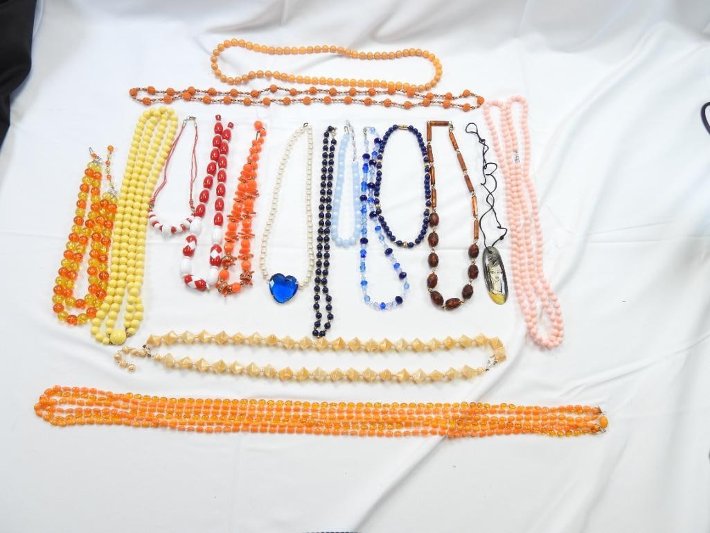 Vintage Jewelry Lot of 17 Acrylic, beaded and carved Necklaces.: Beautiful collection of carved beads faceted, tubular from several decades 30's to 70's