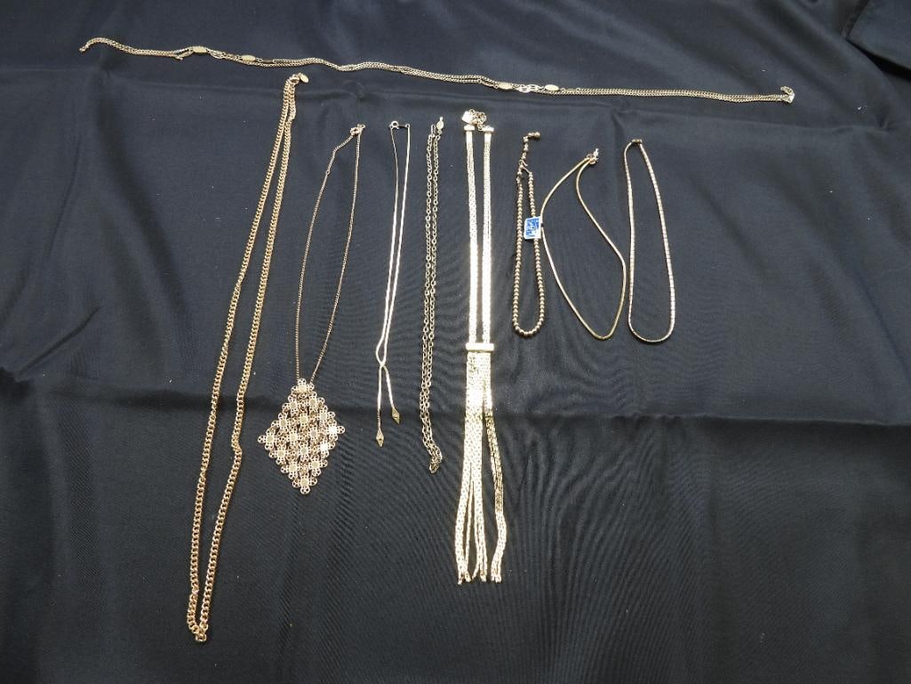 Vintage Jewelry Lot of 9 goldtone necklaces signed KJL, TRIFARI, CORO, SARAH MORE: Plus Avon, Hong Kong, 9 West, Sarah cooventry beautful gold necklace in varous links, vhain styles and beads. One with orginal CORO hang tag.