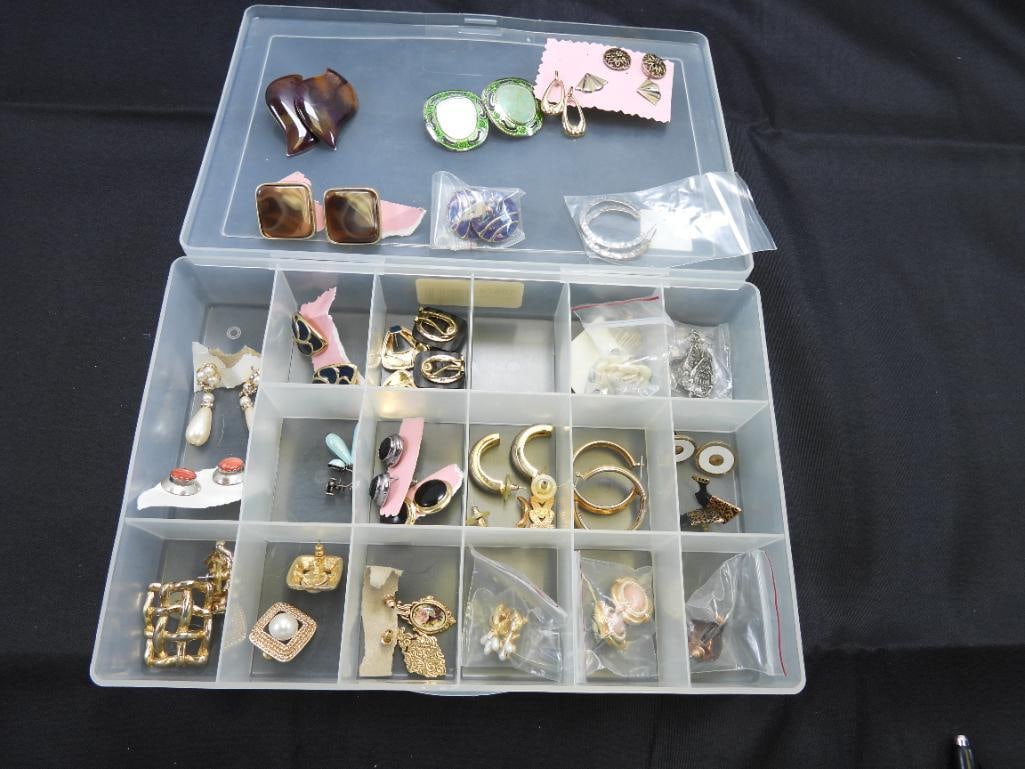 Vintage Jewelry Lot of 31 pair of pierced earrings some sterling, signed and unsigned: Sterling Geri handcrafted, Sterling blue screwbacks, Kyl, Berebi, S, AK and more. Enamel Stones, rhinestones, faux pearl, enamel, and more. Includes the plastic divided storage case.