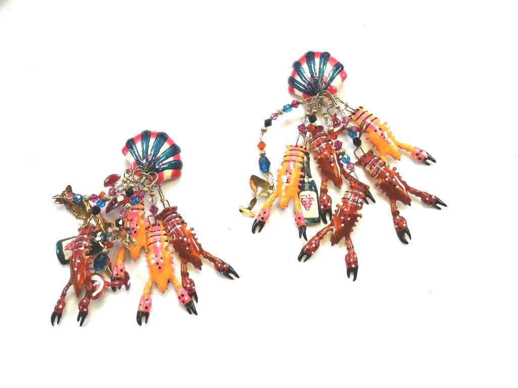 Lunch at The Ritz USA 22KT Gold Plated Lobster Seashell Earrings: Dangly clip earrings with lobsters, wine bottles, seashells; 22Kt Gold Heavy plating with hand applied enamel details, made in the USA . Genuine Austrian Crystals. 4" long.