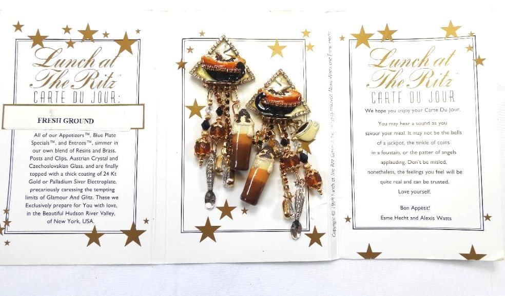 Lunch at The Ritz USA 22KT Gold Plated "Fresh Ground" Coffee Themed Earrings: Fun coffee-themed clip on dangle earrings with 22Kt Gold Heavy plating in the USA . Genuine Austrian Crystals. 1.25" x 3.5" long; Matching pendant brooch in the next lot!