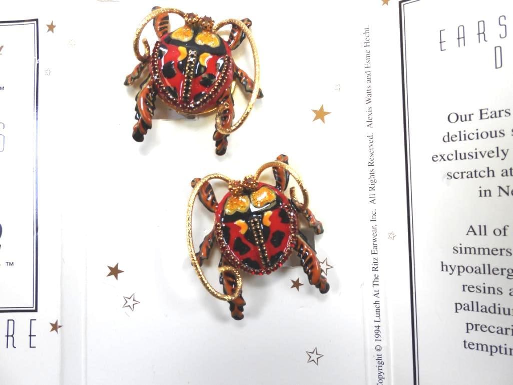 Lunch at The Ritz USA 22KT Gold Plated Earrings, "Bug Bisque": Beautifully enameled red and black clip on earrings made with 22Kt Gold Heavy plating in the USA . Genuine Austrian Crystals. 1.5"x 1.5"