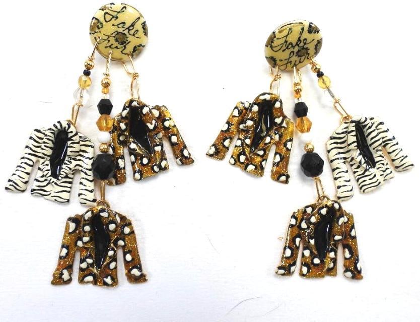 Lunch at The Ritz USA 22KT Gold Plated Fake Fur Coat Earrings, 1989, SIGNED: Pierced post earrings with enameled fur coats hanging from a disc that reads, "Fake Fur" made with 22Kt Gold Heavy plating in the USA . Approx. 1.5" x 3.5" long