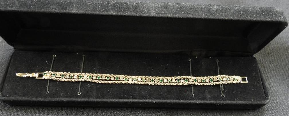 Vintage Gemstone Bracelet in Gift Box: Lovely 3 strand vintage bracelet in yellow unmarked metal and clear and deep green gemstones, 7" long in velvet gift box