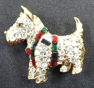Vintage KJL Kenneth J Lane Scottie Scottish Terrier Dog Brooch: Looks new, Gold tone, clear red and green crystalsrhiestones. Bright and shiny. Measures: 1.5" x 1.5"
