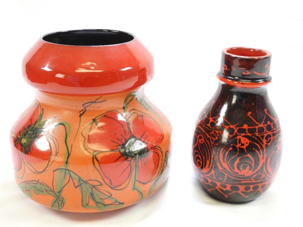 LOT of 2 Italian Pottery Vases by RAYMOR, SIGNED: 2 MCM Italian pottery vases by Raymor including a stunning black and red vase 7.25" tall, and a bright red and orange hand decorated floral vase, approx. 8"x 8" at base; note black and red vase has a