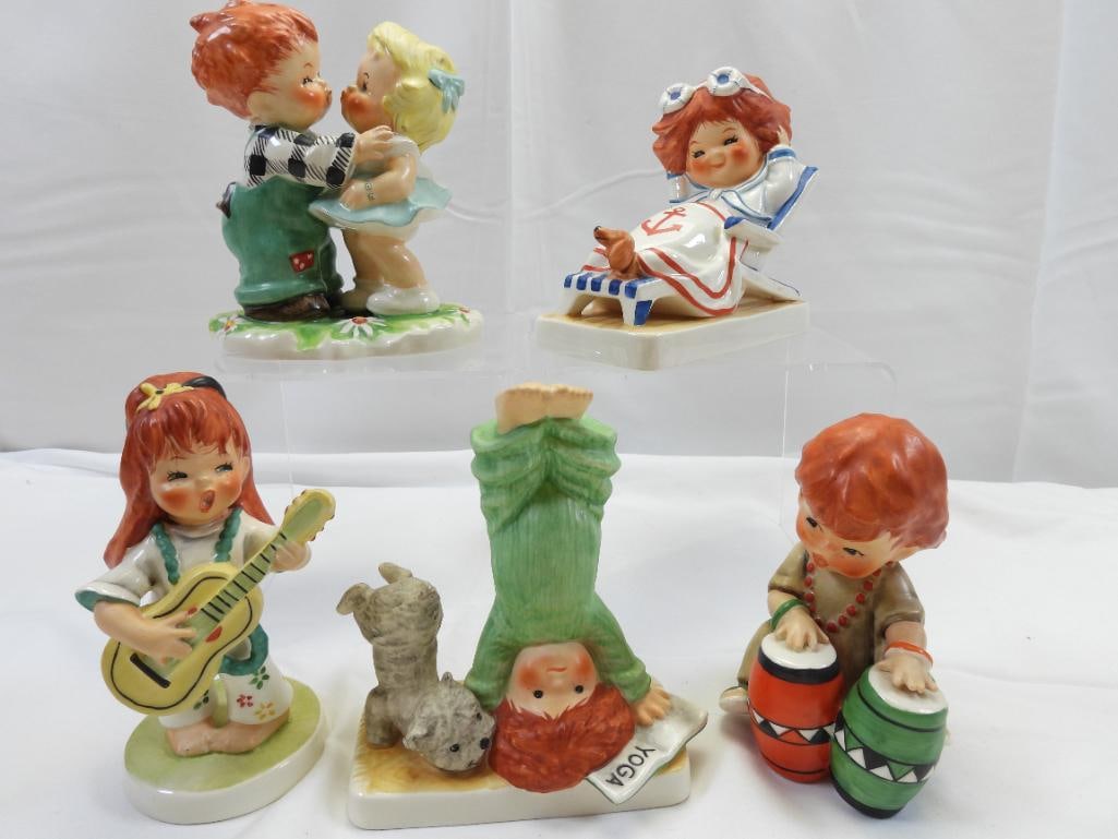 LOT OF 5 GOEBEL M.J. HUMMEL Figurines: Lot of 5 M.J. Hummel figurines "Stolen Kiss", "Yoga" and more; tallest 5.5"