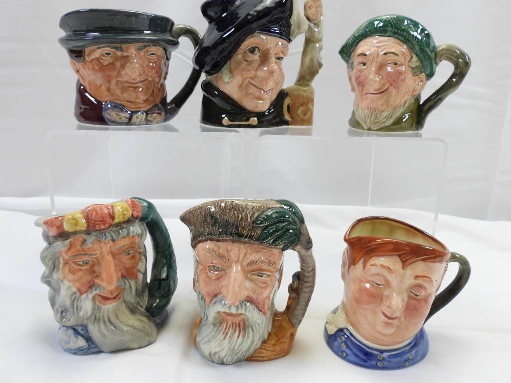 LOT OF 6 ROYAL DOULTON Mugs: Lot includes 6 Royal Doulton of England mugs; "Auld Mac", "Robinson Crusoe", "Tam O'Shanter" 1972, "Neptune", and one more
