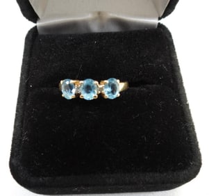 14kt yellow gold Aquamarine and diamond ring sz. 7