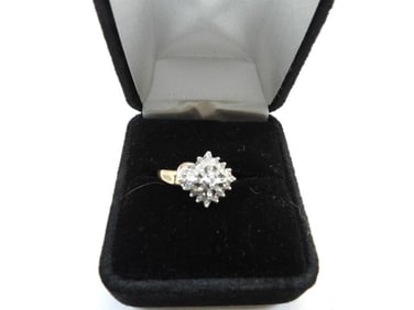10KT yellow and white gold diamond cluster ring size 7.