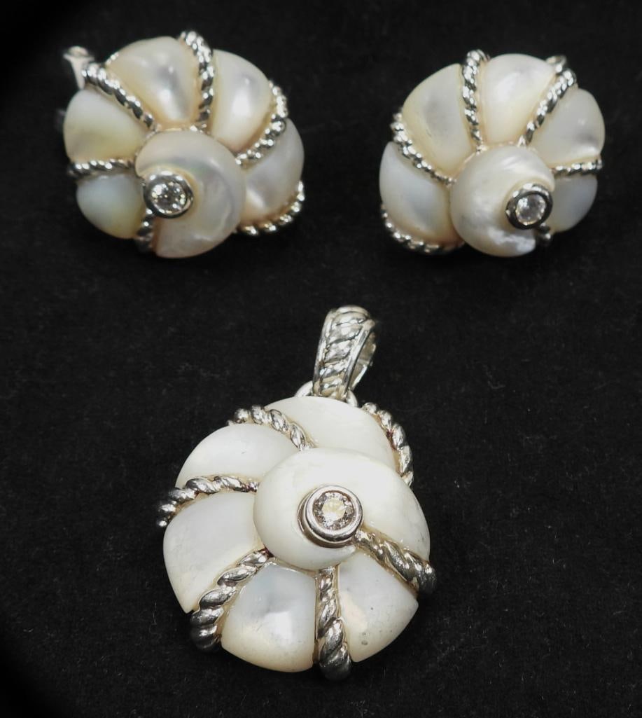JUDITH RIPKA Sterling Silver and Mother of Pearl and Crystal Earrings and Pendant MATCHING SET: JUDITH RIPKA sterling silver with crystals and mother of pearl nautilus pierced post earrings and pendant MATCHING SET; earrings approximately 0.75" wide, and pendant approximately 1.5" long including