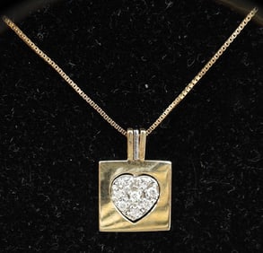 14kt gold 2 tone diamond heart inset pendant necklace 4 grams.