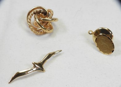 14kt gold earrings, tac pin and pendant