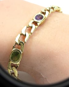 14kt Gold Multi gemstone bracelet 7" 13.5 grams.