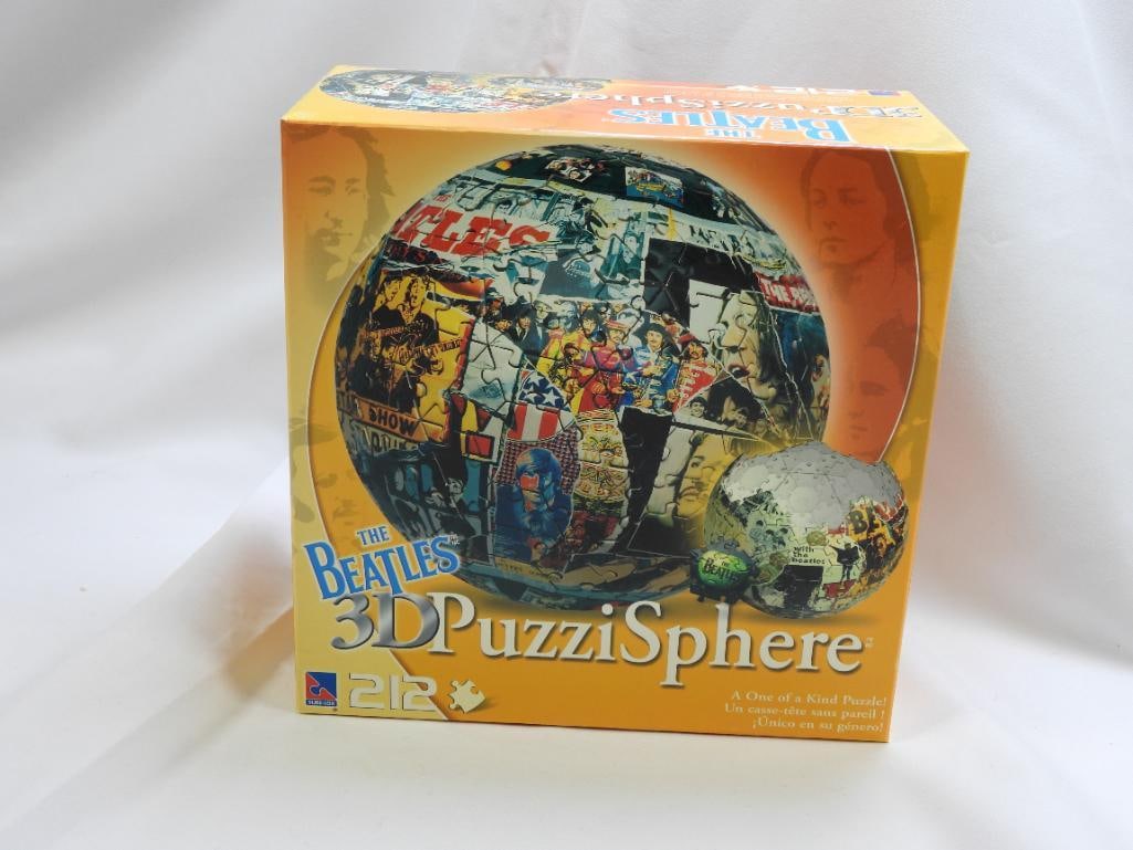 BEATLES 3-D Globe Puzzle, New in Sealed Box: A 3-D Beatles themed globe puzzle with 212 pieces that creates a 9" globe, new in sealed box
