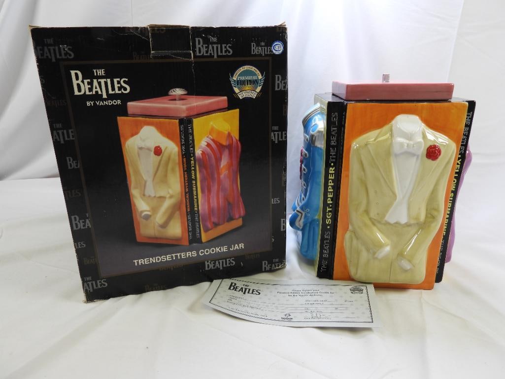THE BEATLES Ceramic Trendsetters Cookie Jar by VANDOR Item #64442, BOXED: The Beatles Trendsetters" ceramic colorful cookie jar by VANDOR, NOTE knob on lid is DAMAGED, approximate size 10.5" tall x 8" x 8", BOXED