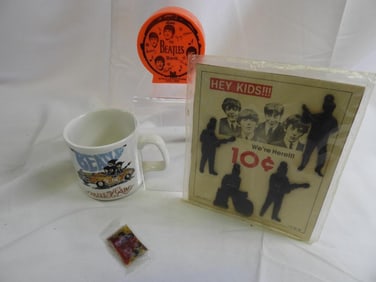 Lot of 3 Beatles  VINTAGE Items includes,  Mug, Coin Bank, and SEALED Rubber Beatles Figures