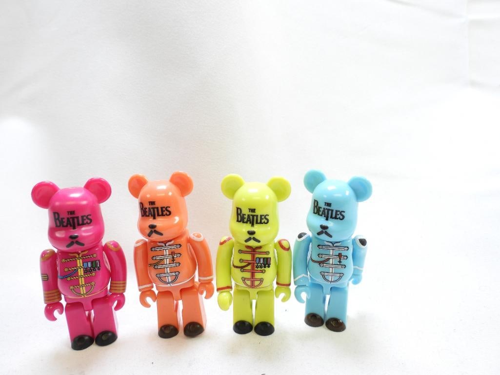 LOT OF 4 BEARBRICK Collectable Toys: Lot includes 4 BEARBRICK collectable plastic toy bears themed "Sgt. Peppers Lonely Heart Club Band", approximately 2.75" tall