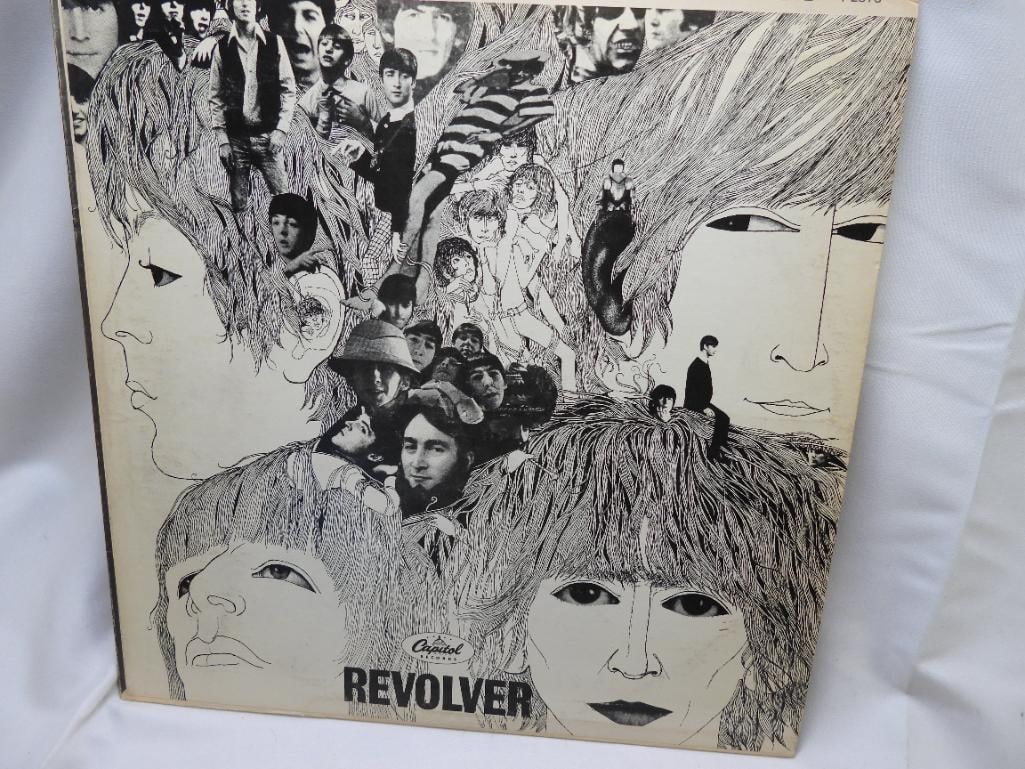 THE BEATLES LP Album "Revolver", released by Capitol Records in Dec 1965: THE BEATLES LP Album "Revolver", released by Capitol Records in Aug 1966, is the 7th studio album by THE BEATLES. This album was THE BEATLES' final recording project before their retirement as live pe
