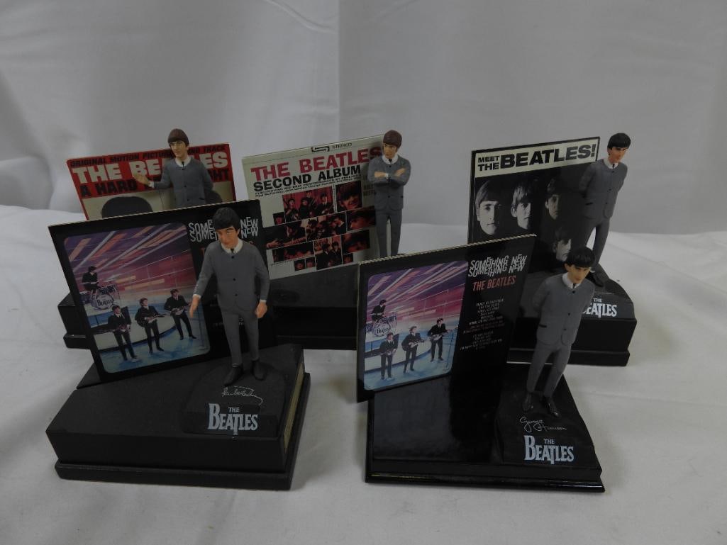 LOT OF 5 MEET THE BEATLES Figurines an Stands: Interesting and large lot includes 5 "Meet the Beatles" figurines on stands with replica album covers, approximately 5" tall, one foot on George Harrison figurine is damaged
