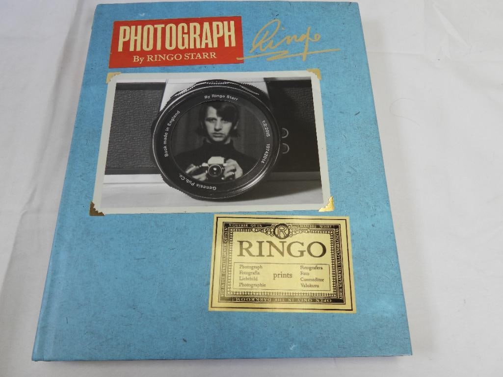 Photograph By RINGO STARR hardcover book: Photograph by RINGO STARR oversized hardcover book of his personal photos starting from baby photos on forward and photos from Dezo Hoffman and Bob Freeman, photographers who took of a lot of pictures