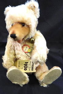 Vintage STEIFF 15" teddy bear: Vintage STEIFF approx. 15" tall golden teddy bear with blue collar with bell, original STEIFF ear button, moveable joints so can stand and sit freely, may have light discoloration due to age, overall