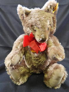 Vintage STEIFF 15" Original Teddy Bear: Vintage STEIFF approx. 15" tall Original Teddy Bear with moveable joints, has original tag and STEIFF ear button, may have light discoloration due to age, overall clean.