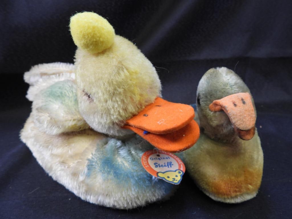 Vintage STEIFF 11" duck and 4" duck: Vintage STEIFF approx. 11" duck with original tag and STEIFF button on wing and 4" duck, may have discoloration due to age, overall clean.