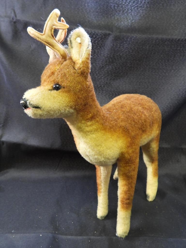 Vintage STEIFF 13" deer: Vintage STEIFF approx. 13" tall deer with STEIFF ear button, may have discoloration due to age, overall clean.