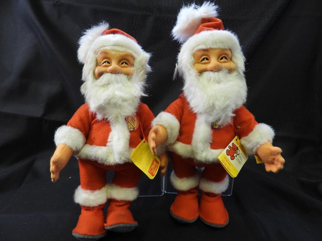 Vintage STEIFF pair of 12" Santa Claus replica 1953: Vintage STEIFF pair of approx. 12" tall Santa Claus replica 1953 with original tags and STEIFF arm buttons, may have discoloration due to age, overall clean.