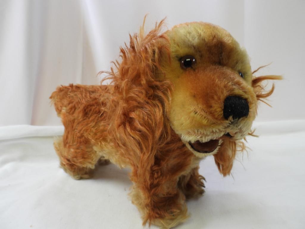 Vintage STEIFF 13" long dog: Vintage STEIFF approx. 13" long and 10" tall dog, with STEIFF ear button, may have discoloration due to age, overall clean