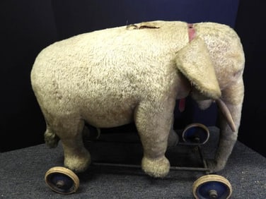 Vintage large 17" tall elephant on wheels