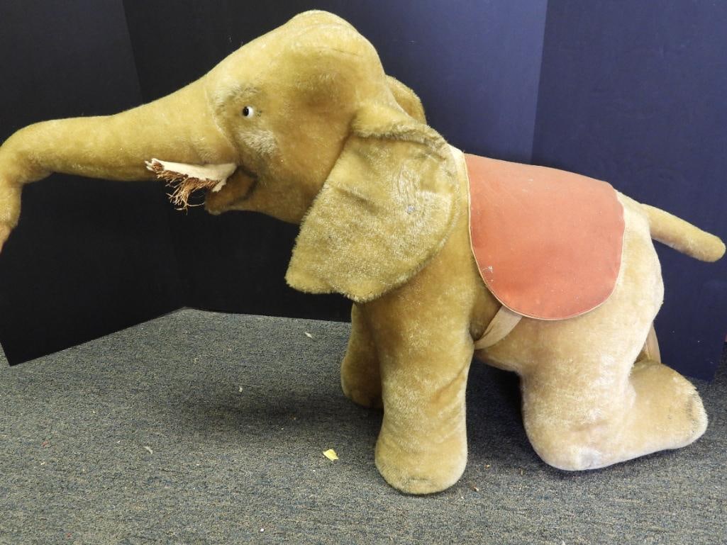 Vintage large 32" long STEIFF elephant: Vintage large STEIFF elephant approx. 32" long, 22" tall with STEIFF button on ear, one eye removed and wear on tusk, see pictures for wear