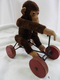 Vintage 8" monkey on wheels